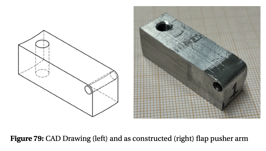 CAD drawing and machined ACS flap pusher arm on graph paper