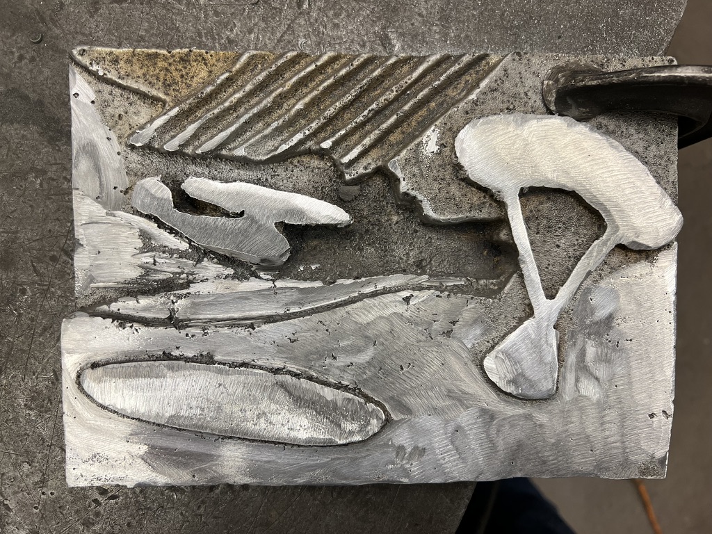 Apollo-inspired aluminum relief casting with polished spacecraft and parachute details
